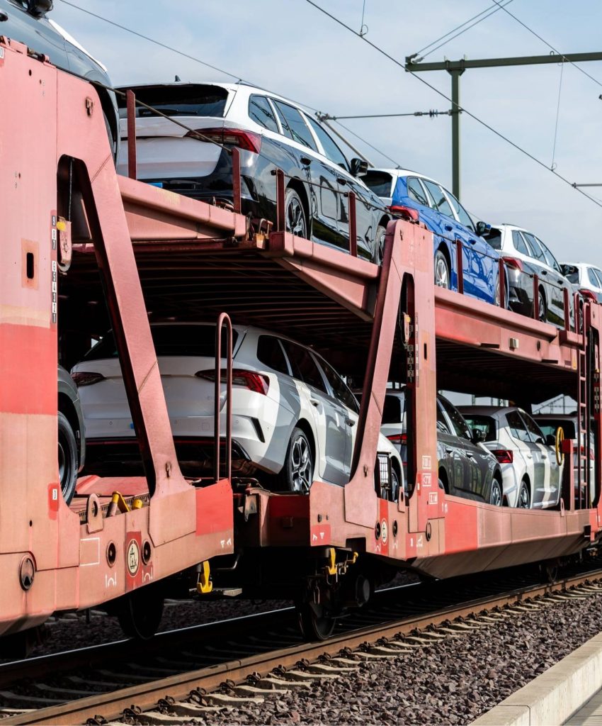 cars-transported-on-train-wagons-for-distribution-2026-03-17-00-01-58-utc (1)